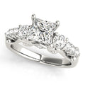 Round Cut Three Stone Engagement Ring